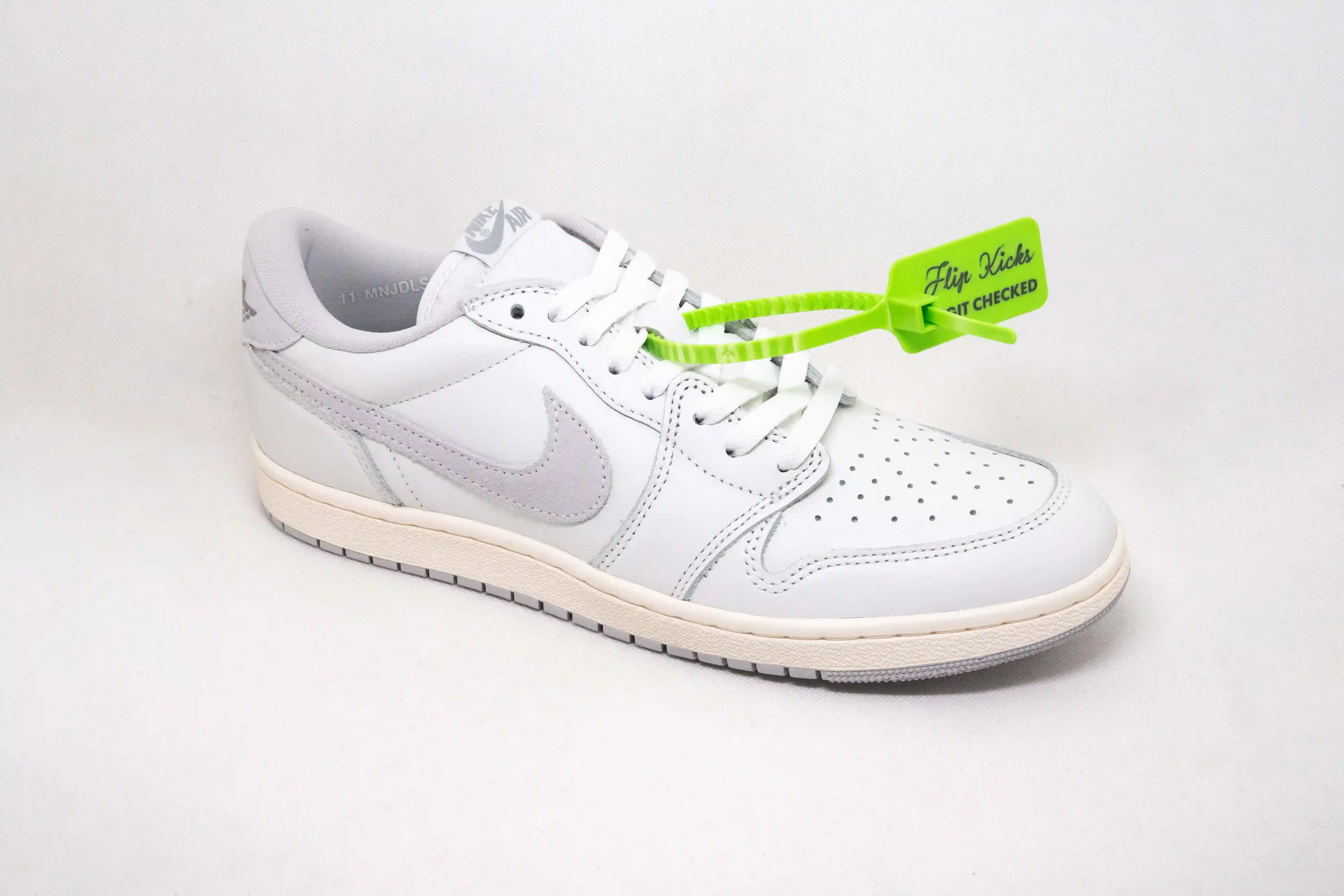 Jordan 1 bajo 85 gris neutral