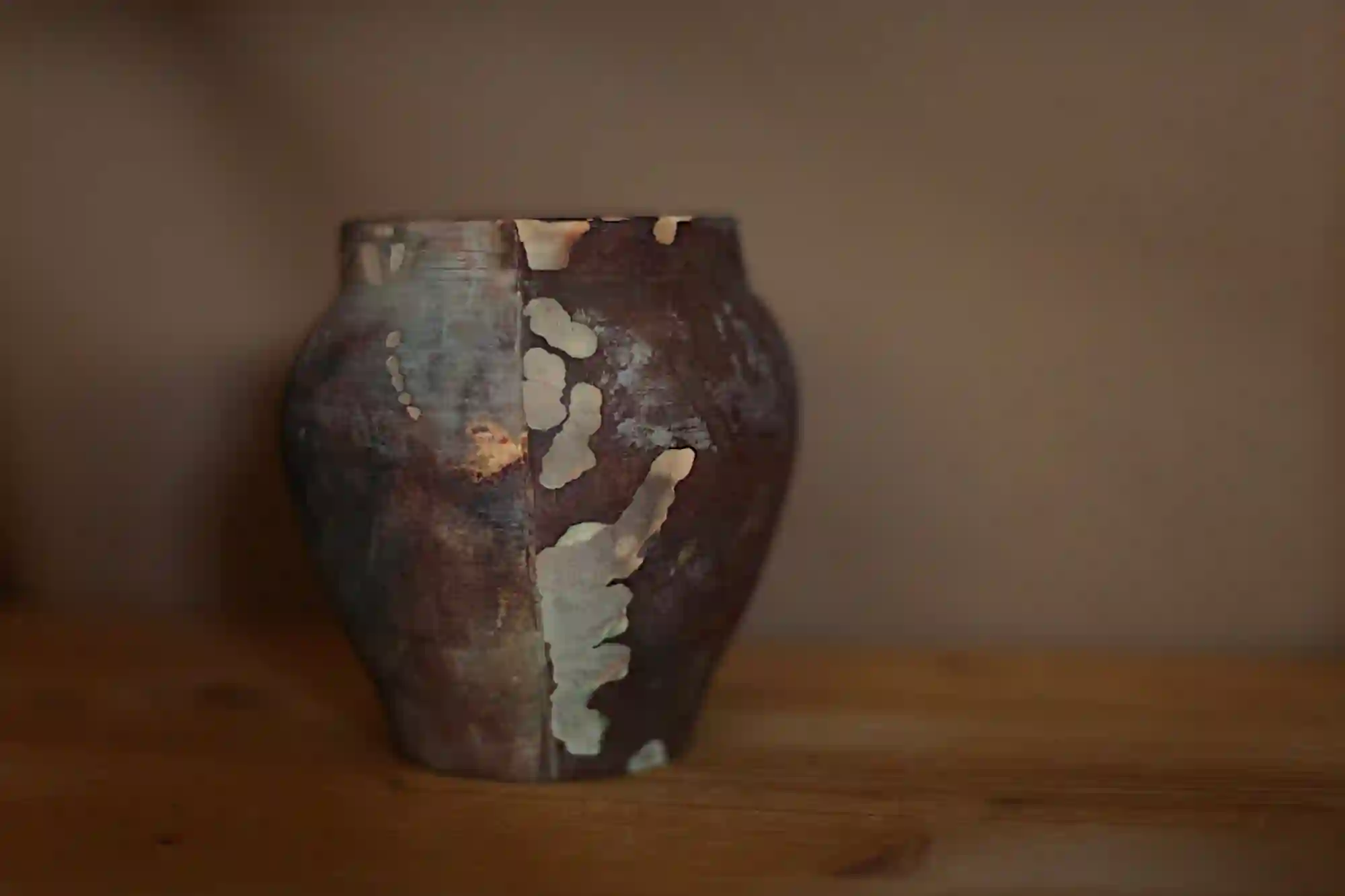 Decorative pit fired vessel