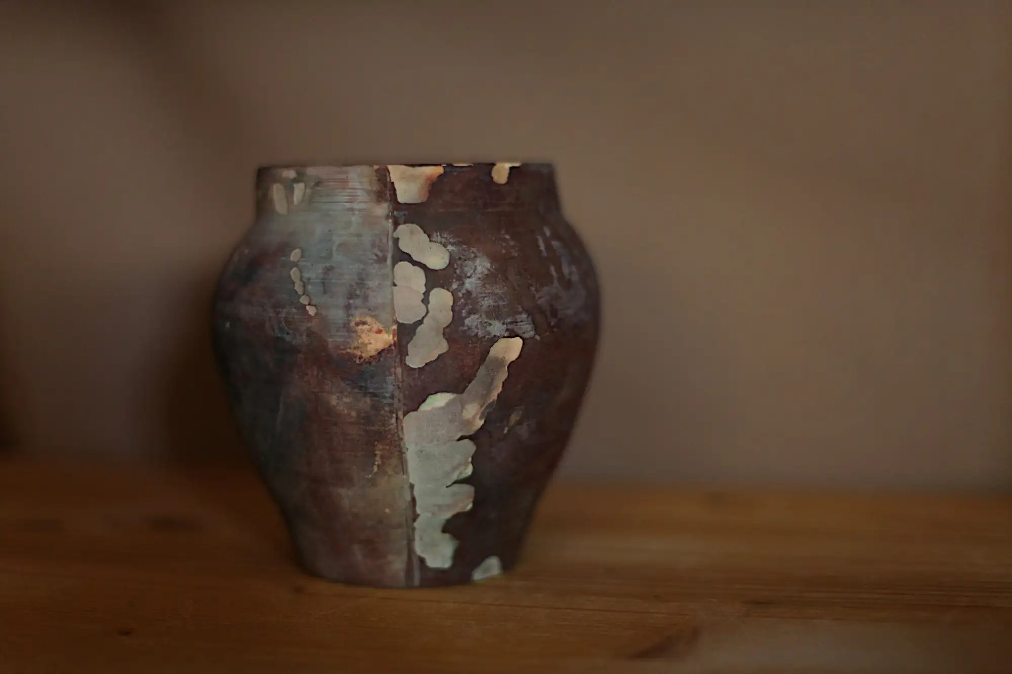 Decorative pit fired vessel