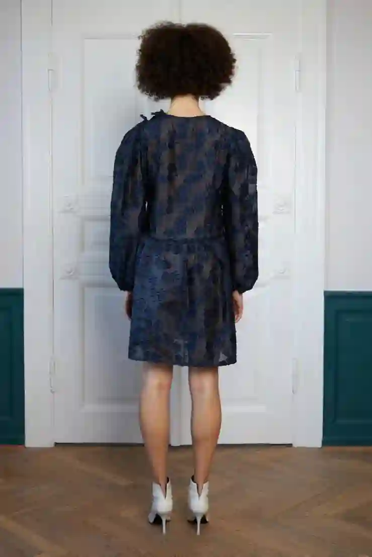 Stella nova luz tejida mini vestido