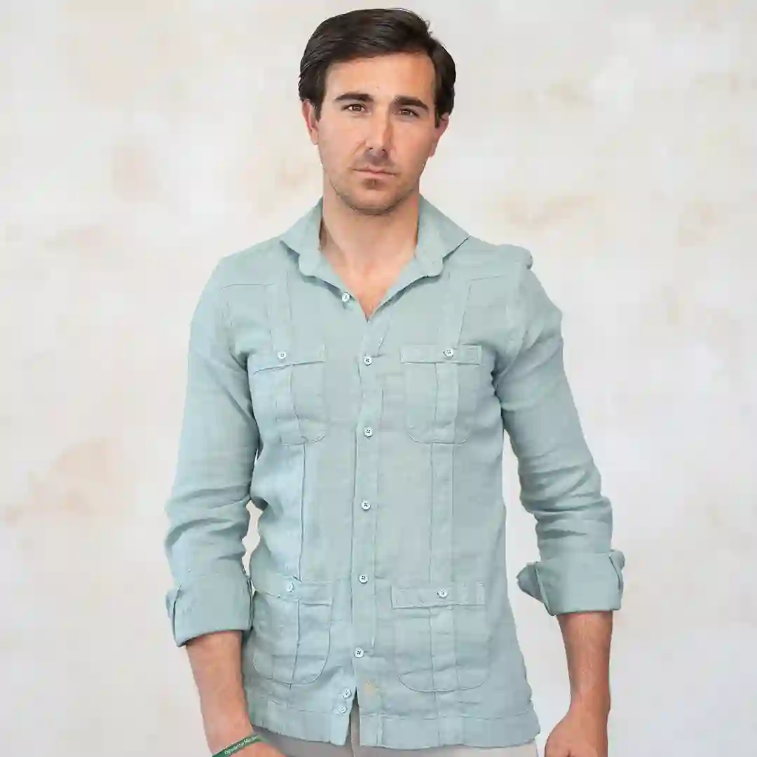 Green guayabera with contrasting gold logo.