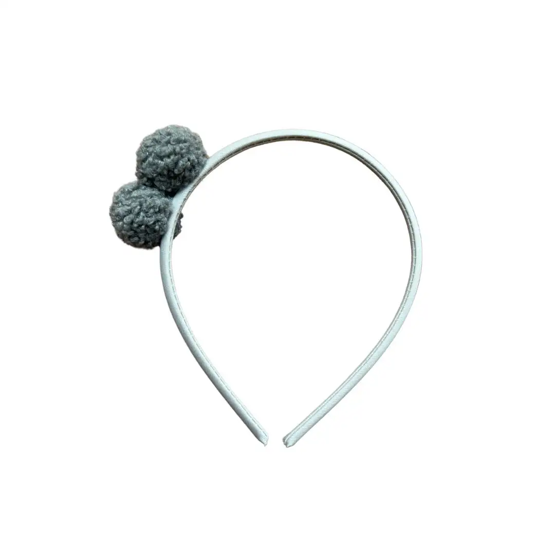 Headband with 2 gray sheepskin pom poms