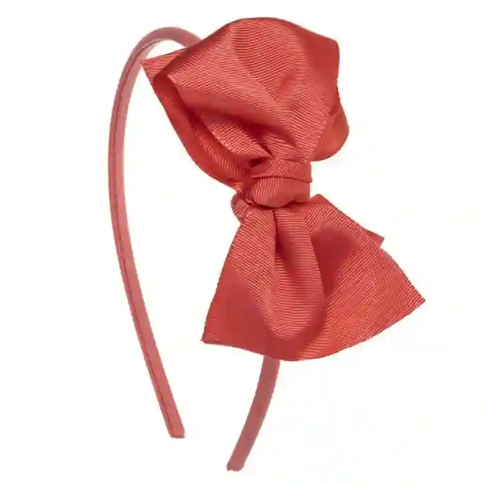 Coral cross bow headband