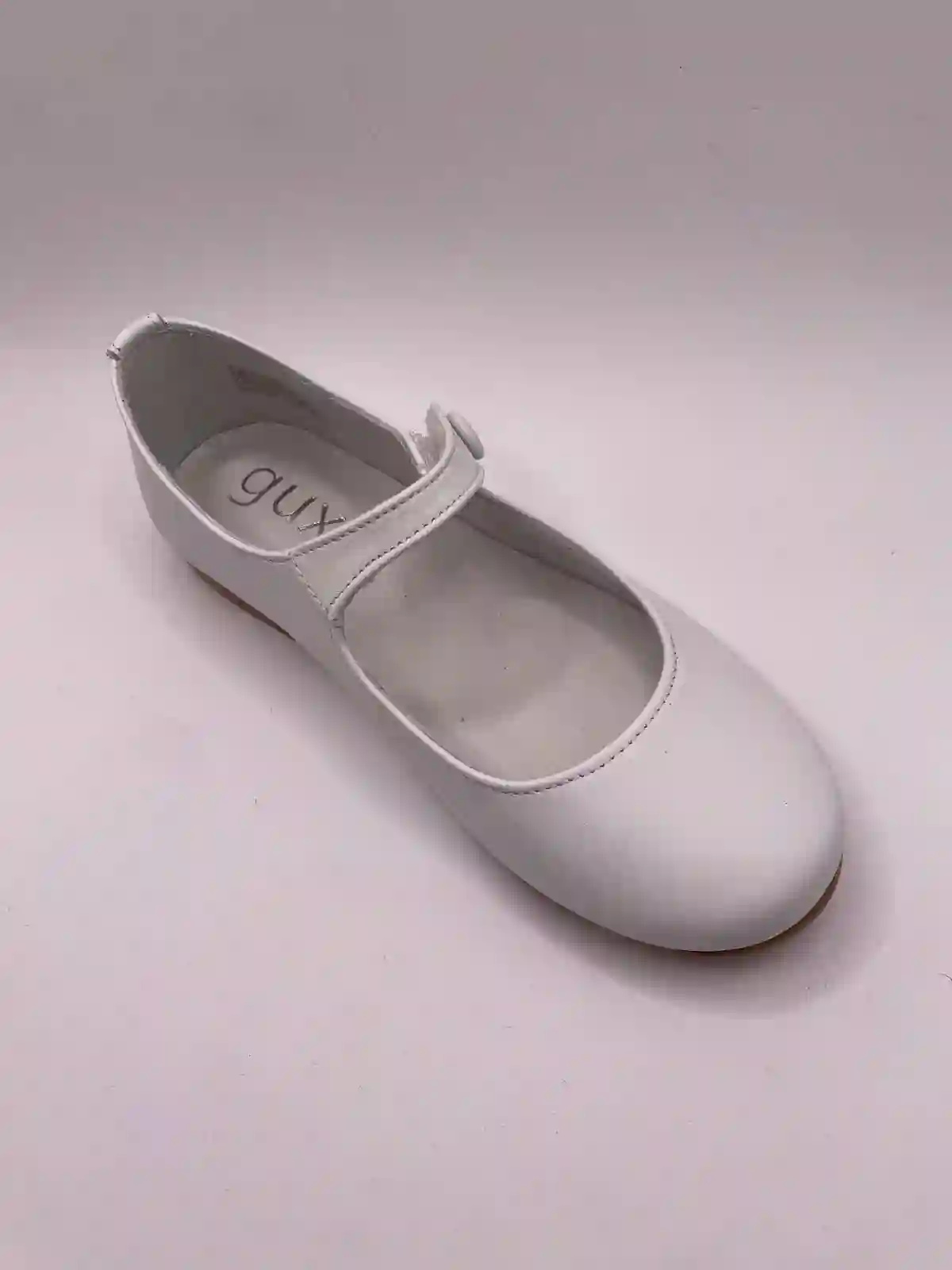 white button Mary Janes