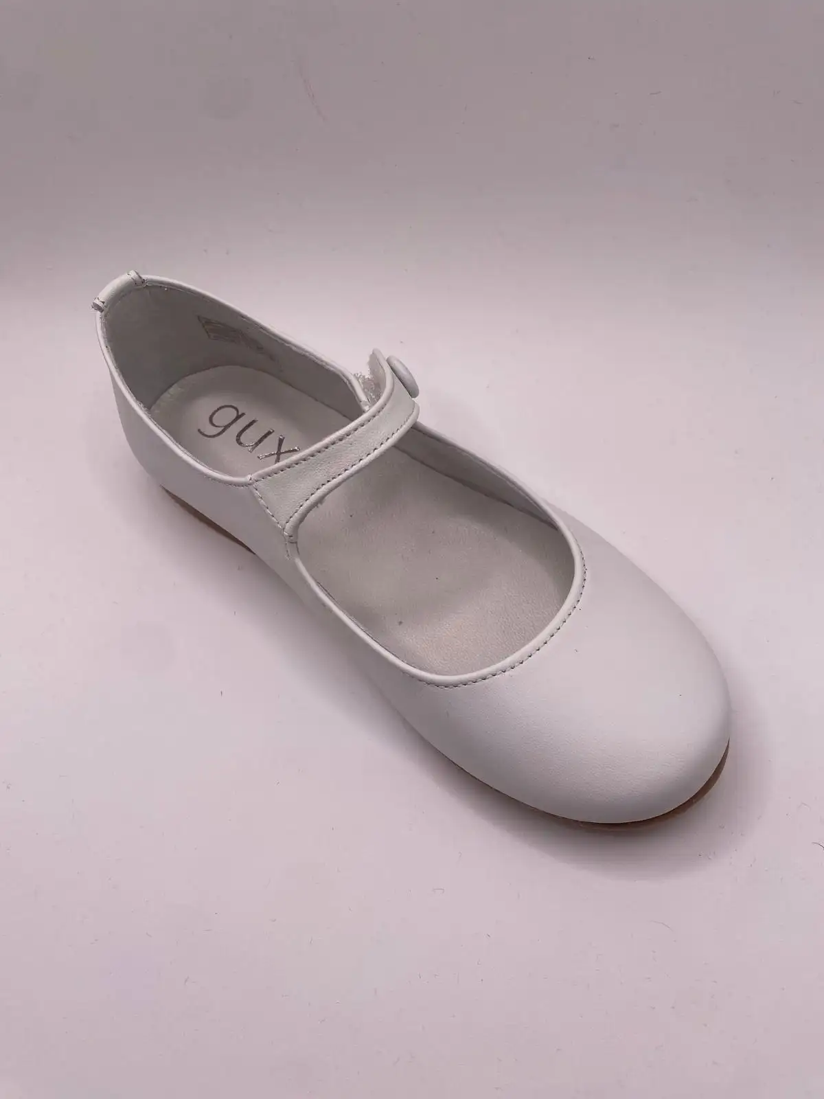 white button Mary Janes