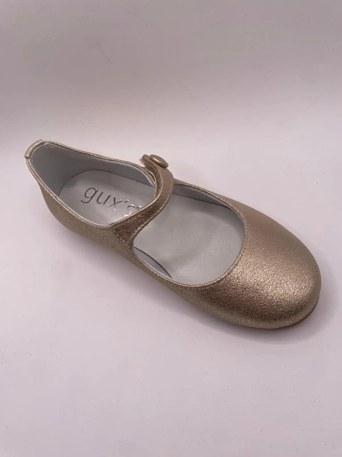 Golden button Mary Janes