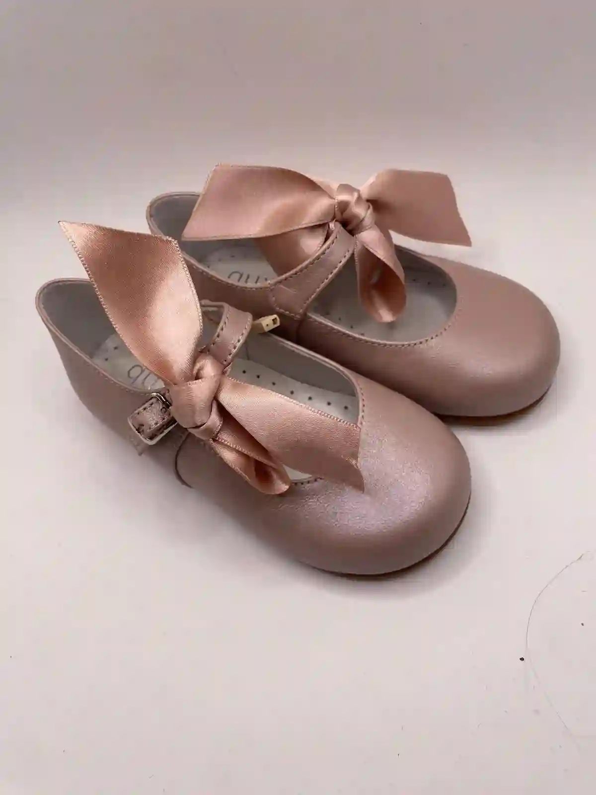 Pink Mary Janes with bow