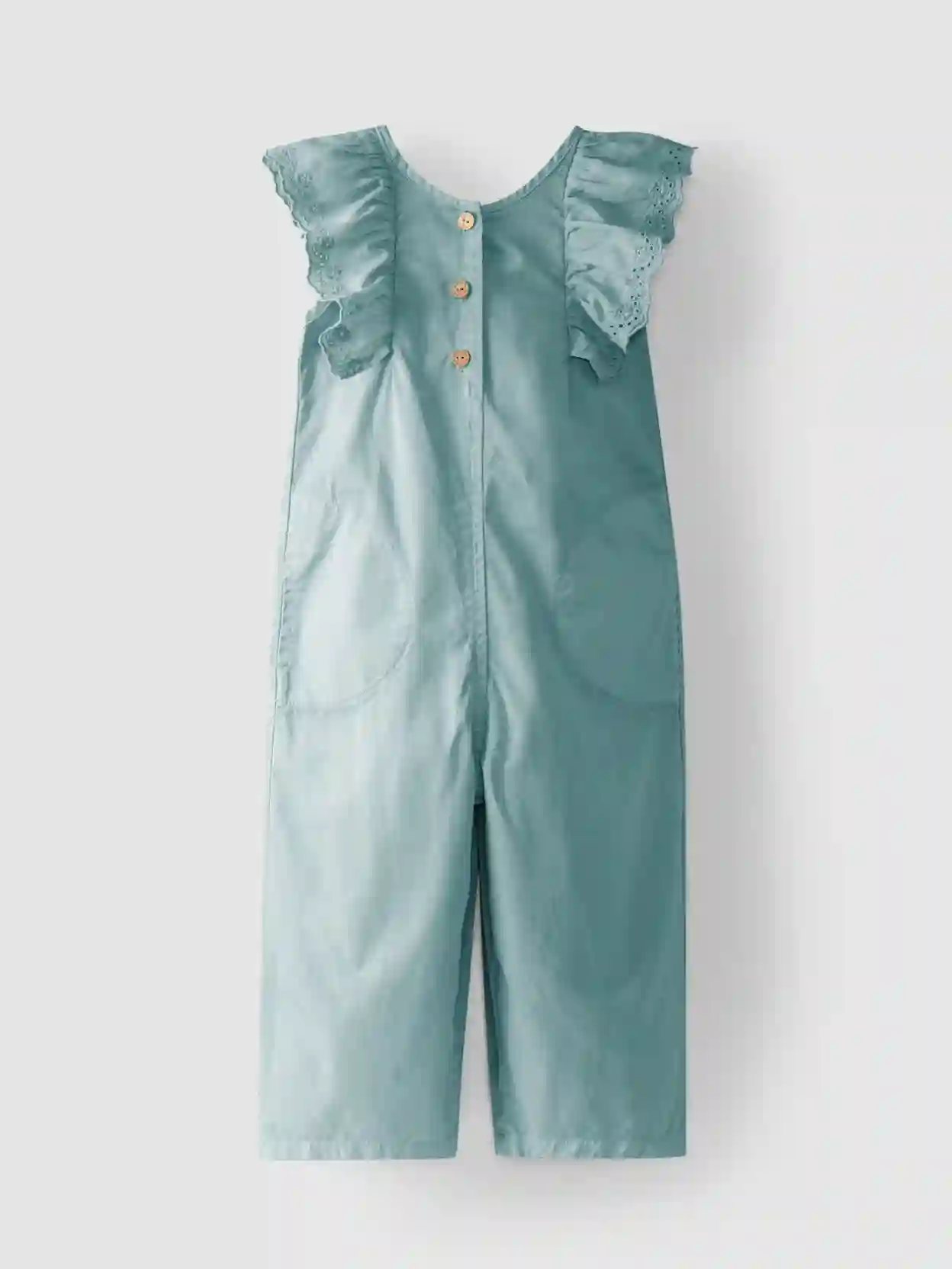 Peto con volante verde