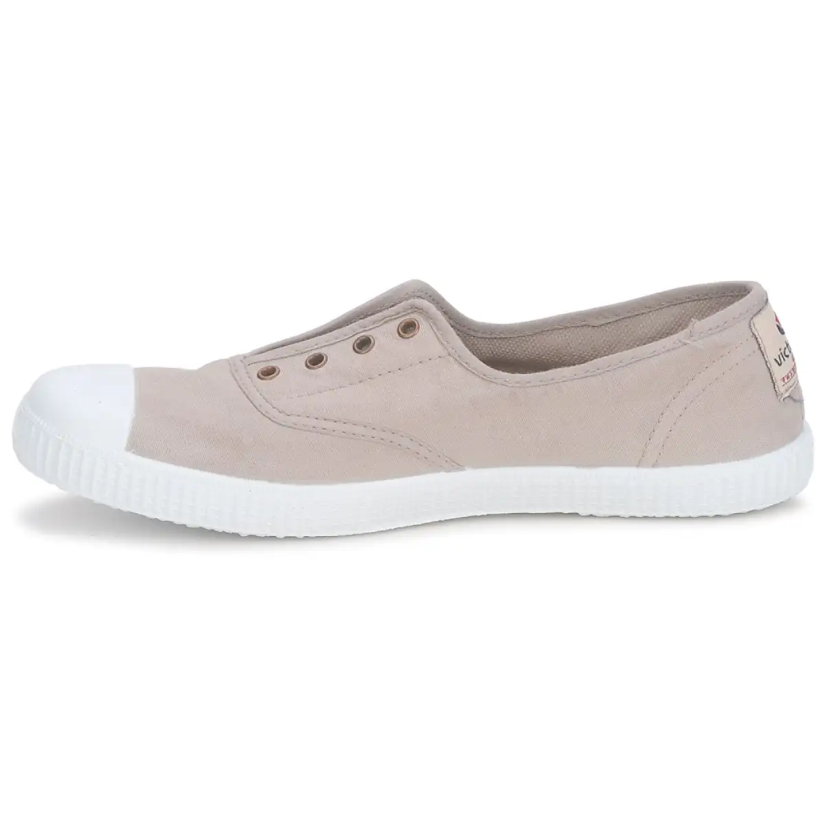 Her beige sandals - Image 4