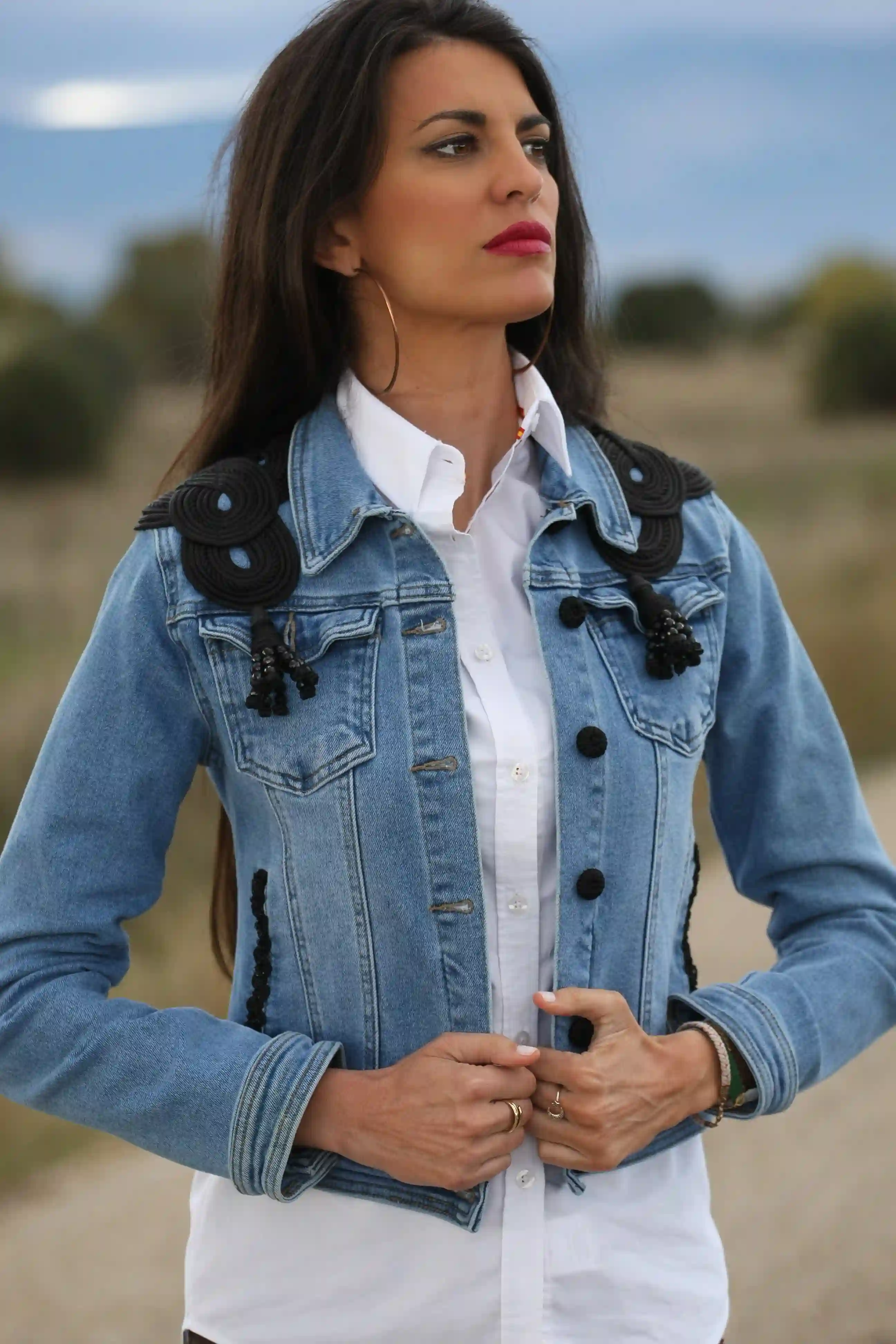 Bullfighting-inspired denim jacket.