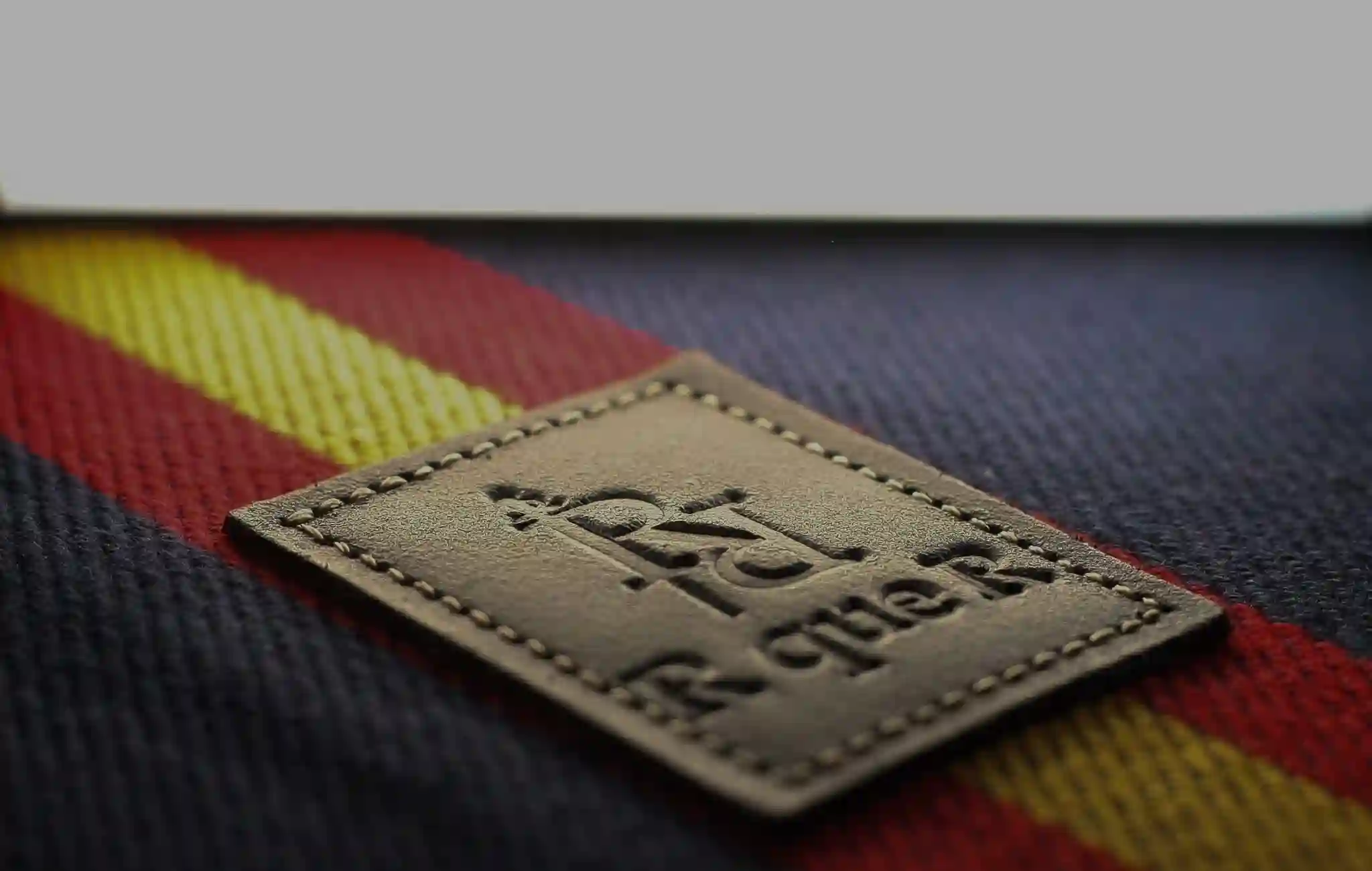Navy blue bullfighting pad with flag of Spain