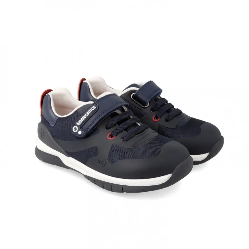 Zapatilla deportiva conrdón elástico y velcro. Tallas 25 a 34.
