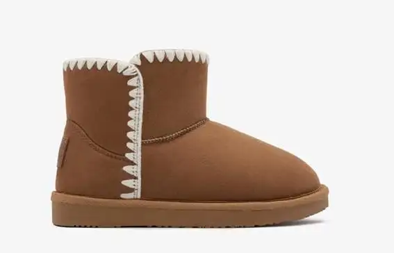 Bota australiana con detalle bordado cuero. Tallas 24 a 38.