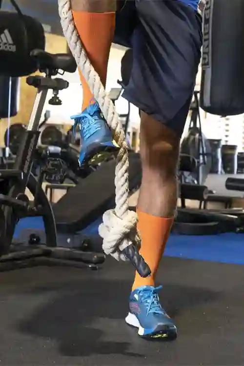 Orange running socks man