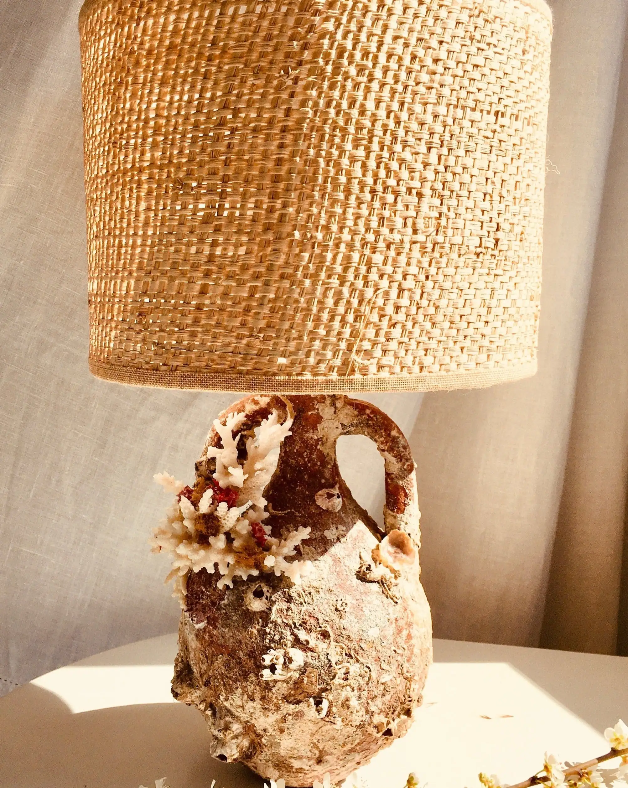 Terracota lamp made with aged amphora with marine life