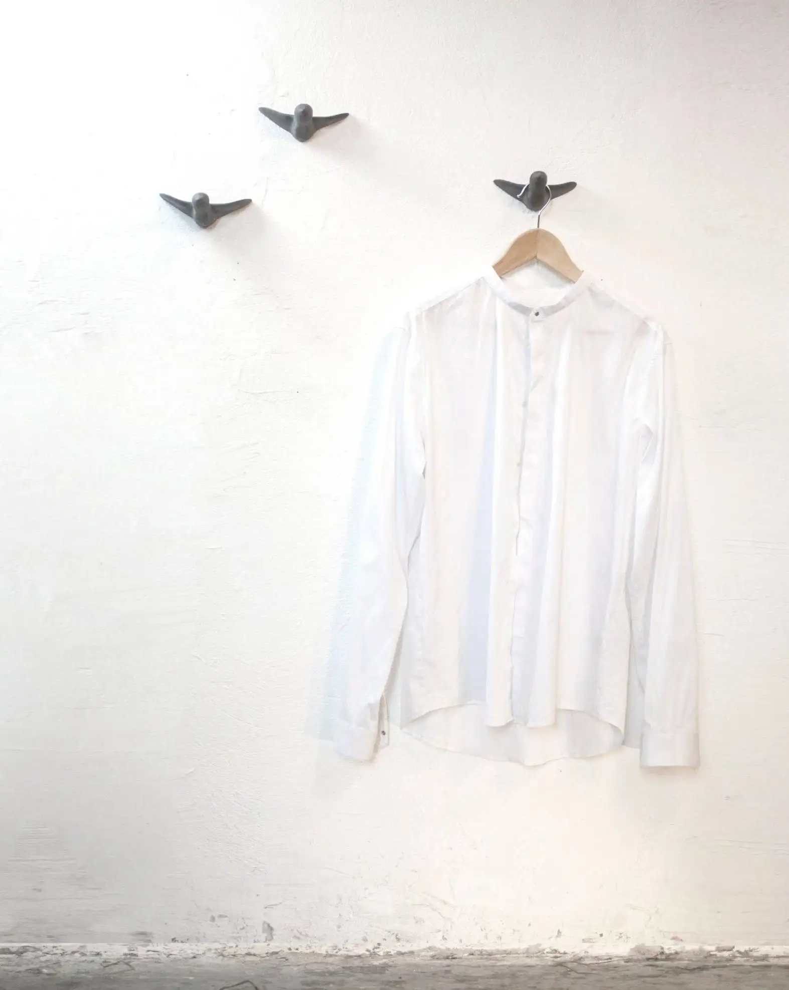 Black concrete wall hangers