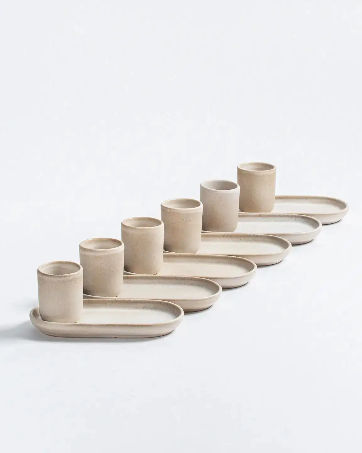 Small coffee cups with dishes