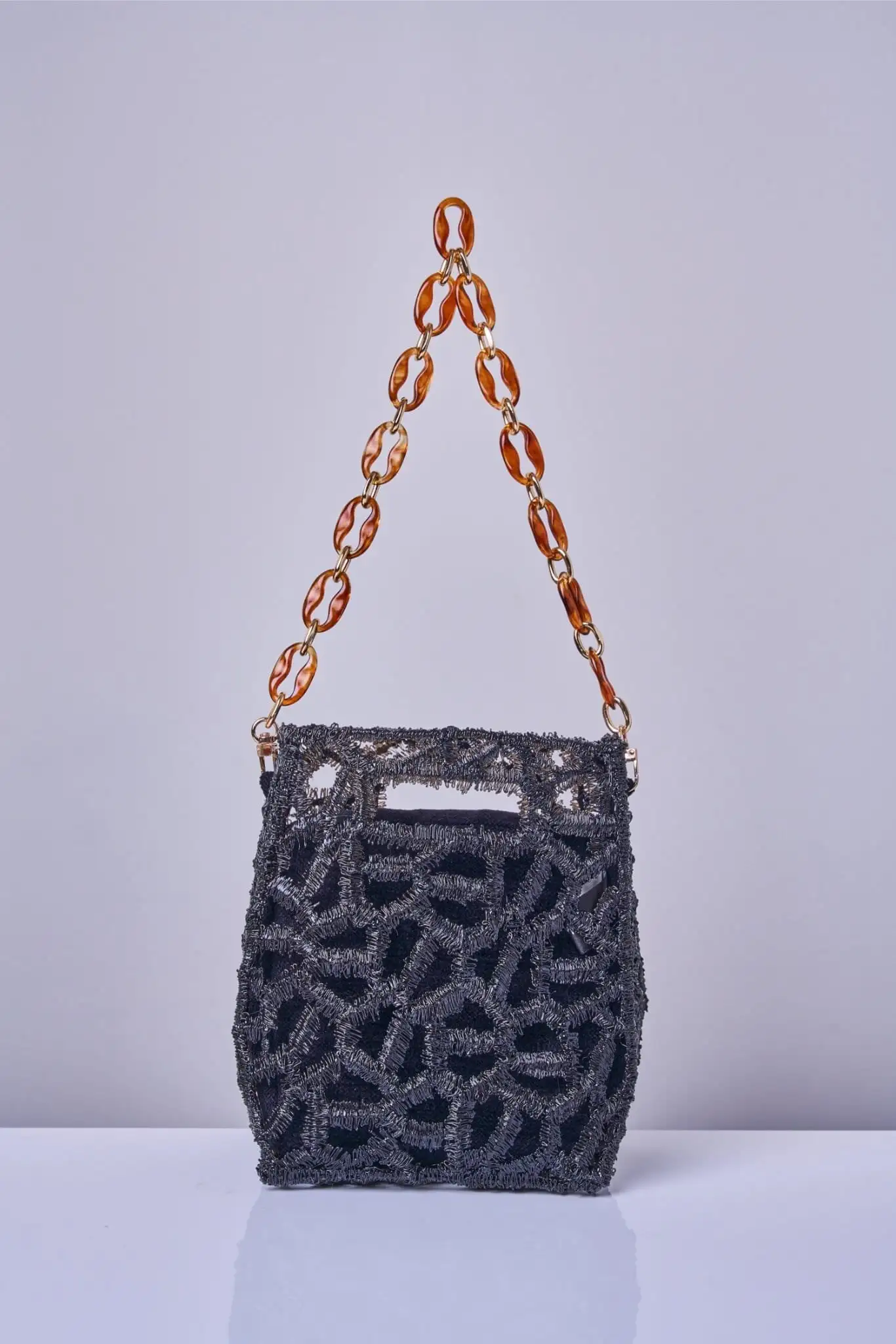BOLSO TUBO PRISMA