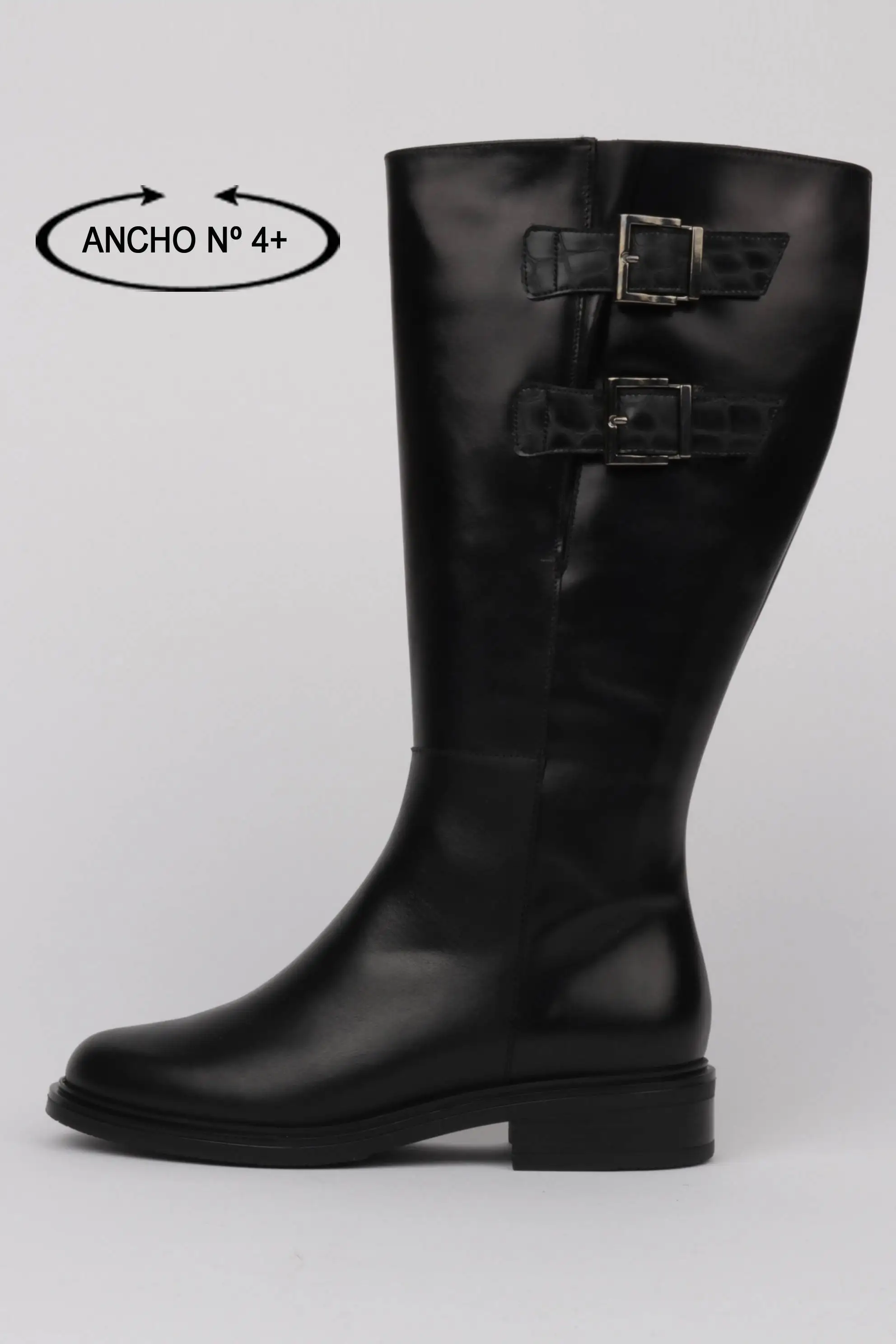 Botas negras planas mujer detalle hebillas