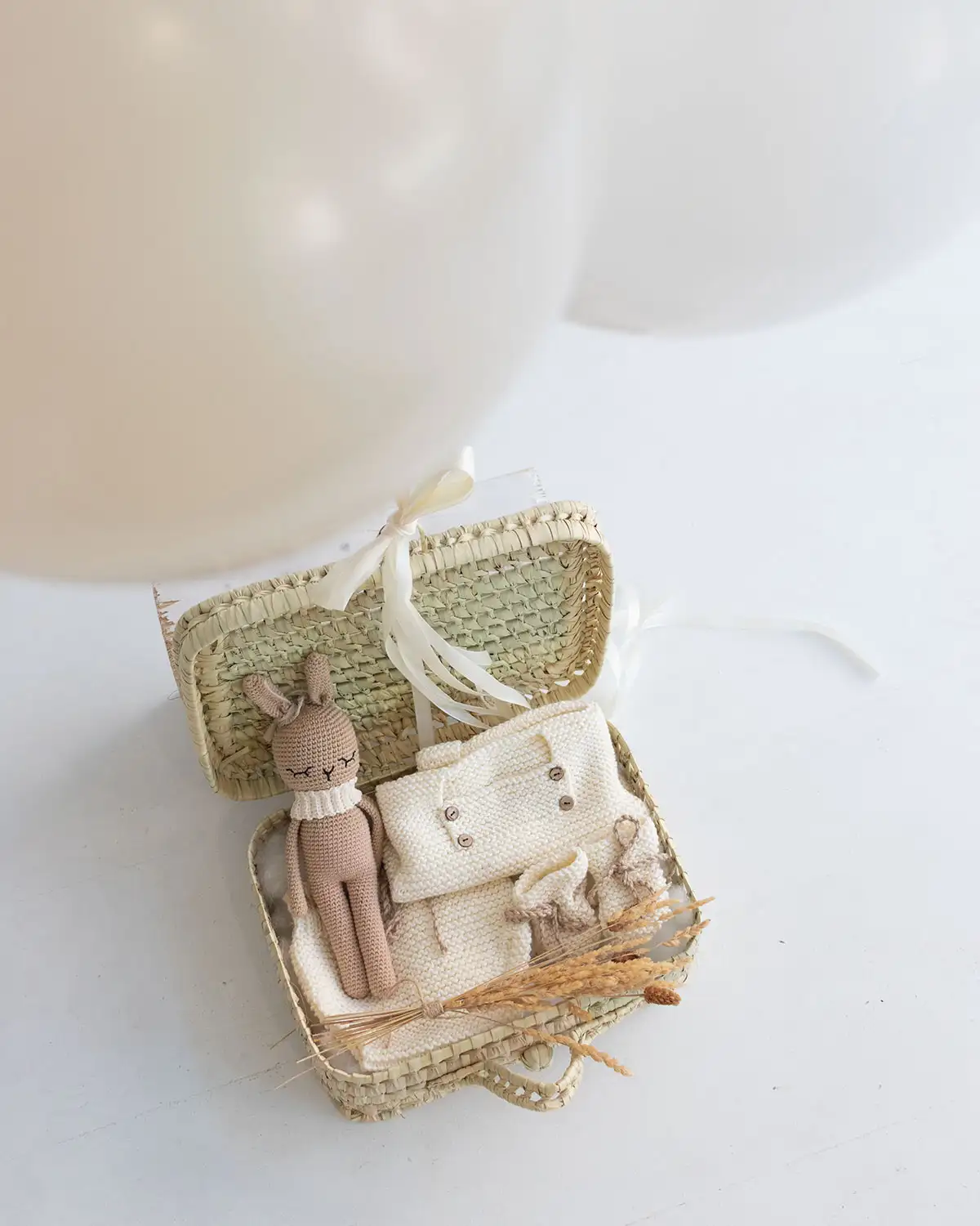 CAPAZO BEBÉ CON GLOBOS