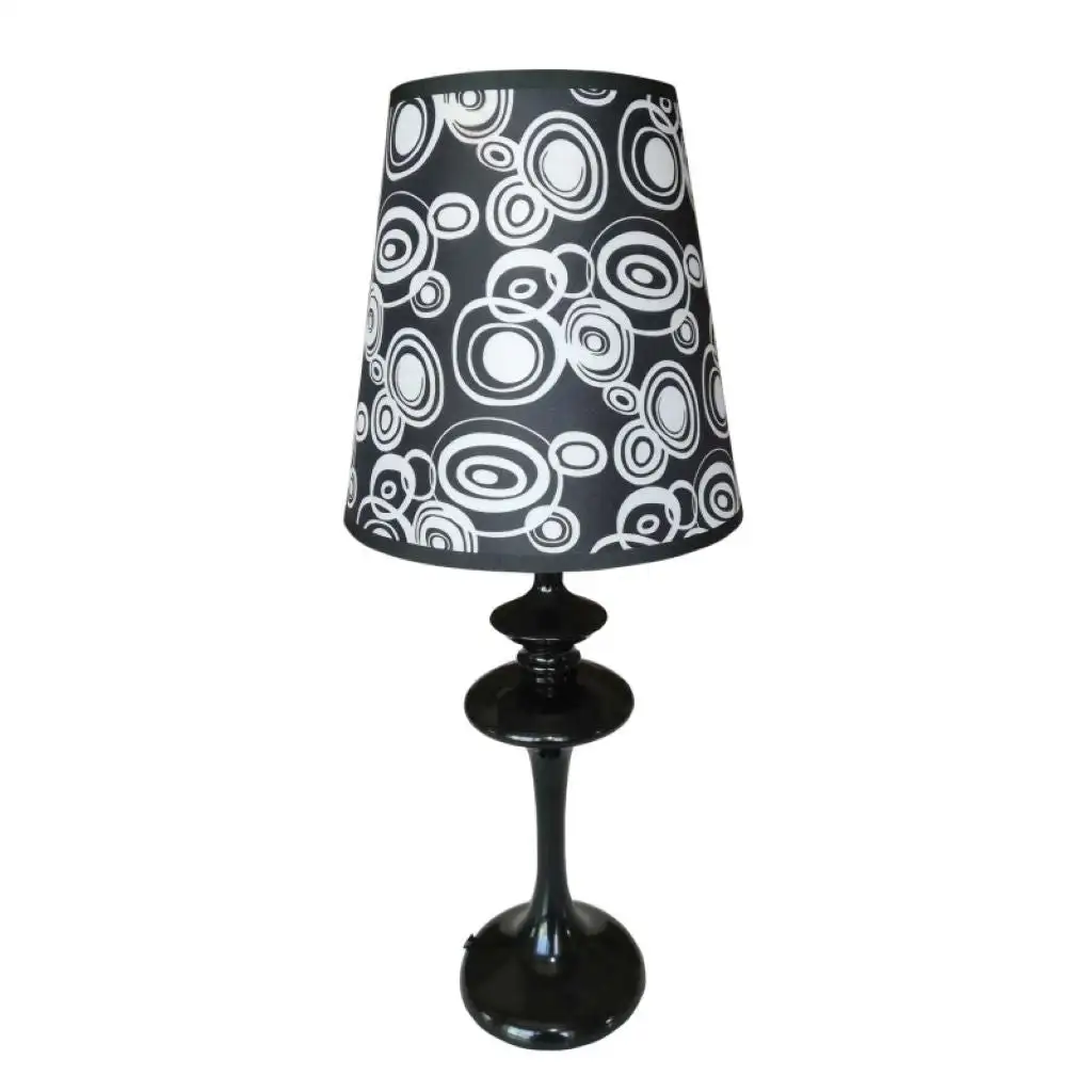 Black desktop lamp with patterned screen