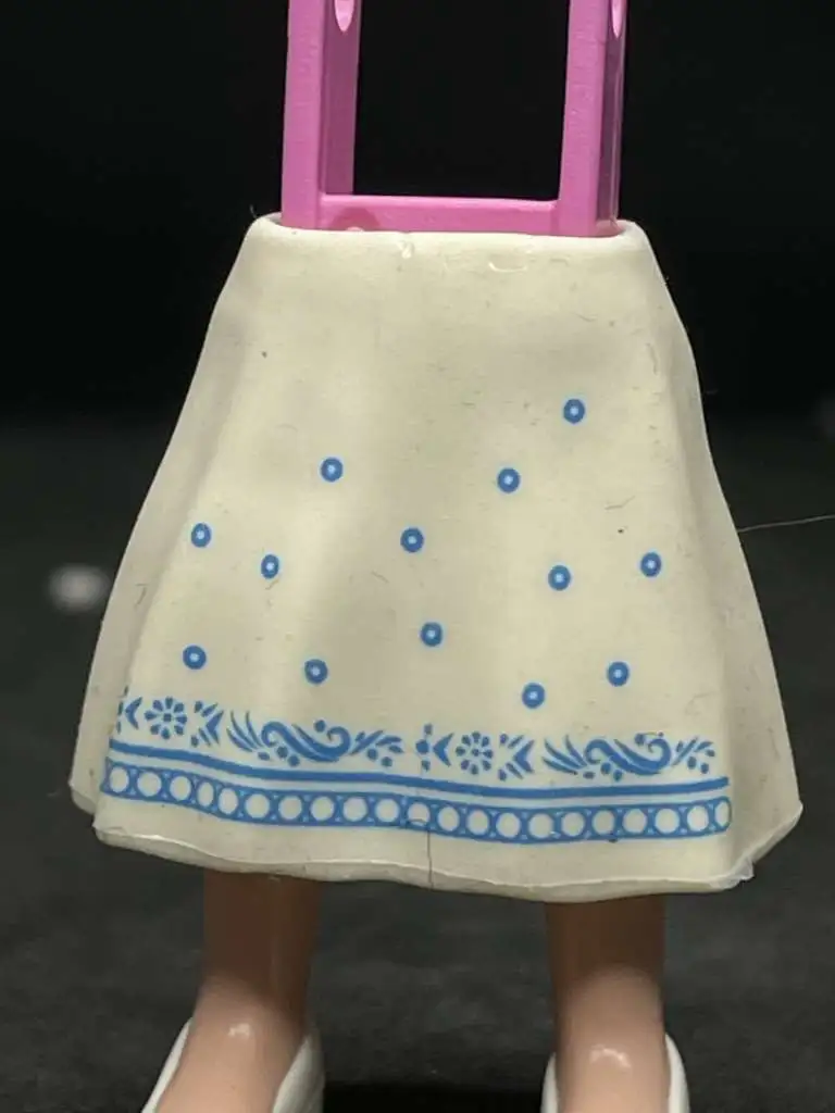 VES0072 FALDA SILICONA CON VOLO BLANCO ROTO ESTAMPADO