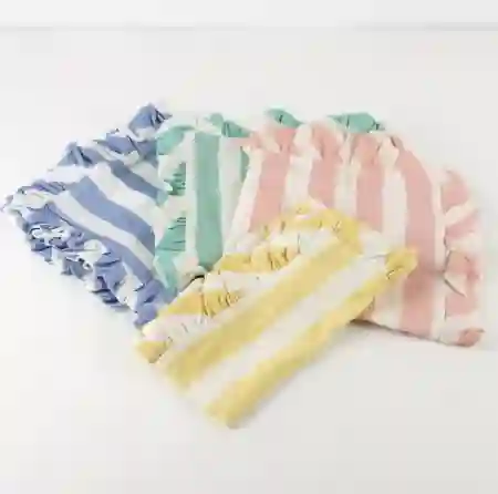 Servilletas de tela con volantes a rayas