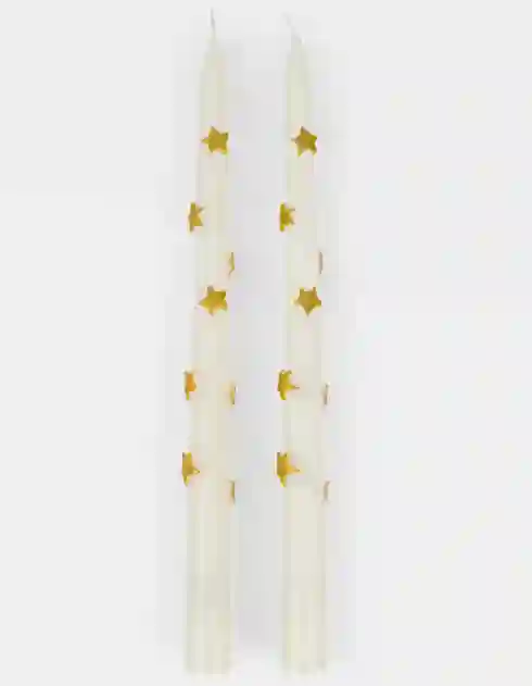 Vela con estrellitas doradas