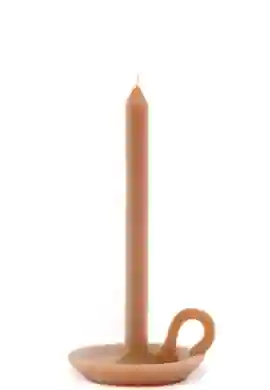 Orange candle with plate