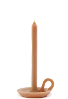 Orange candle with plate