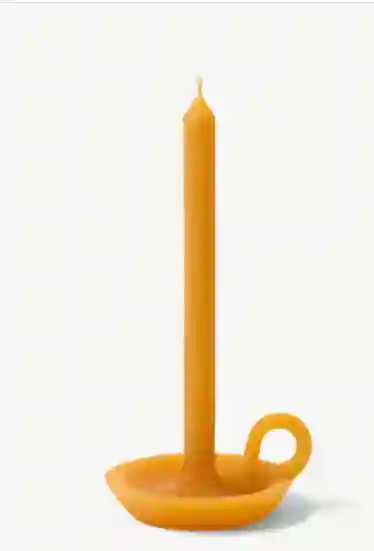Orange candle with plate