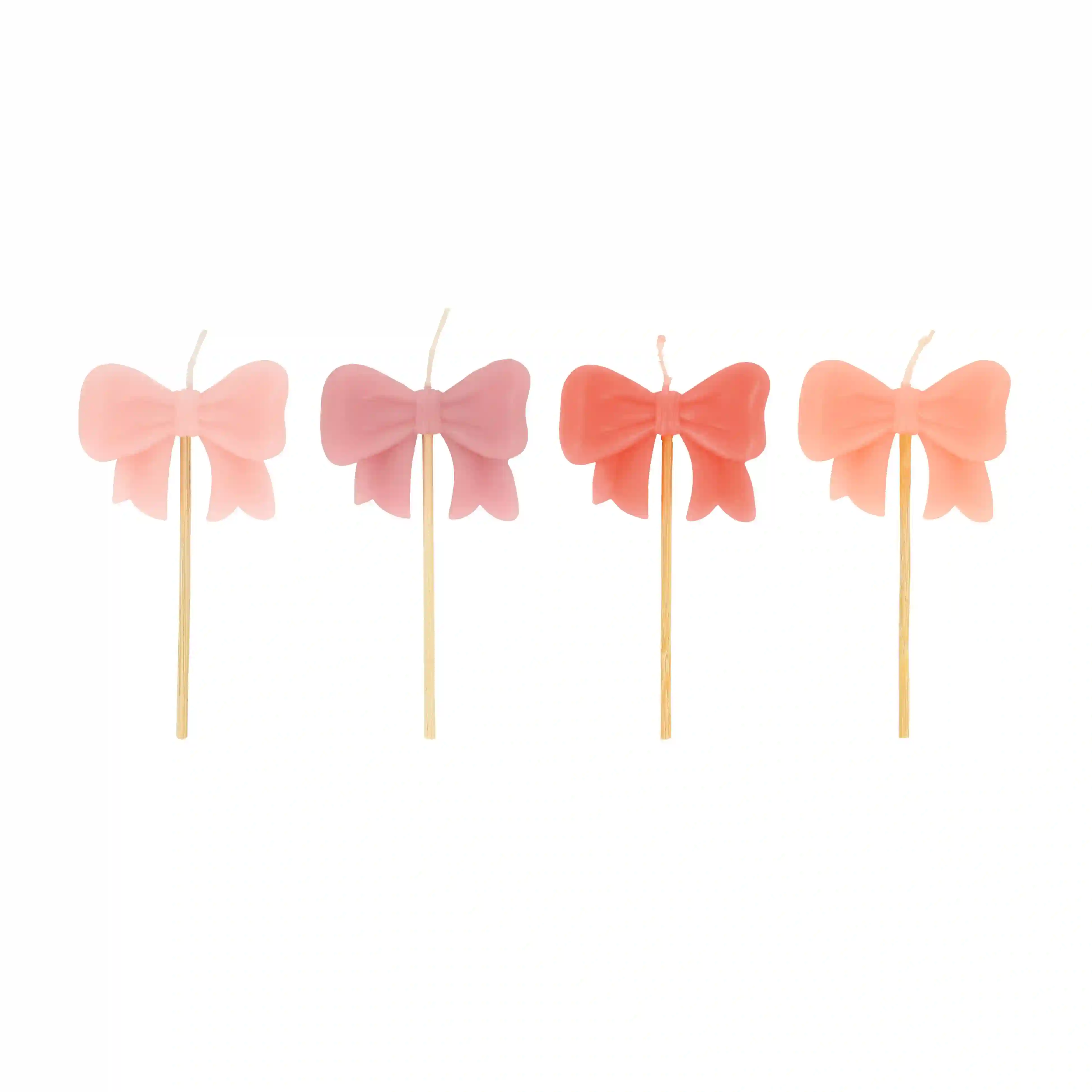 Velas de lazos rosa