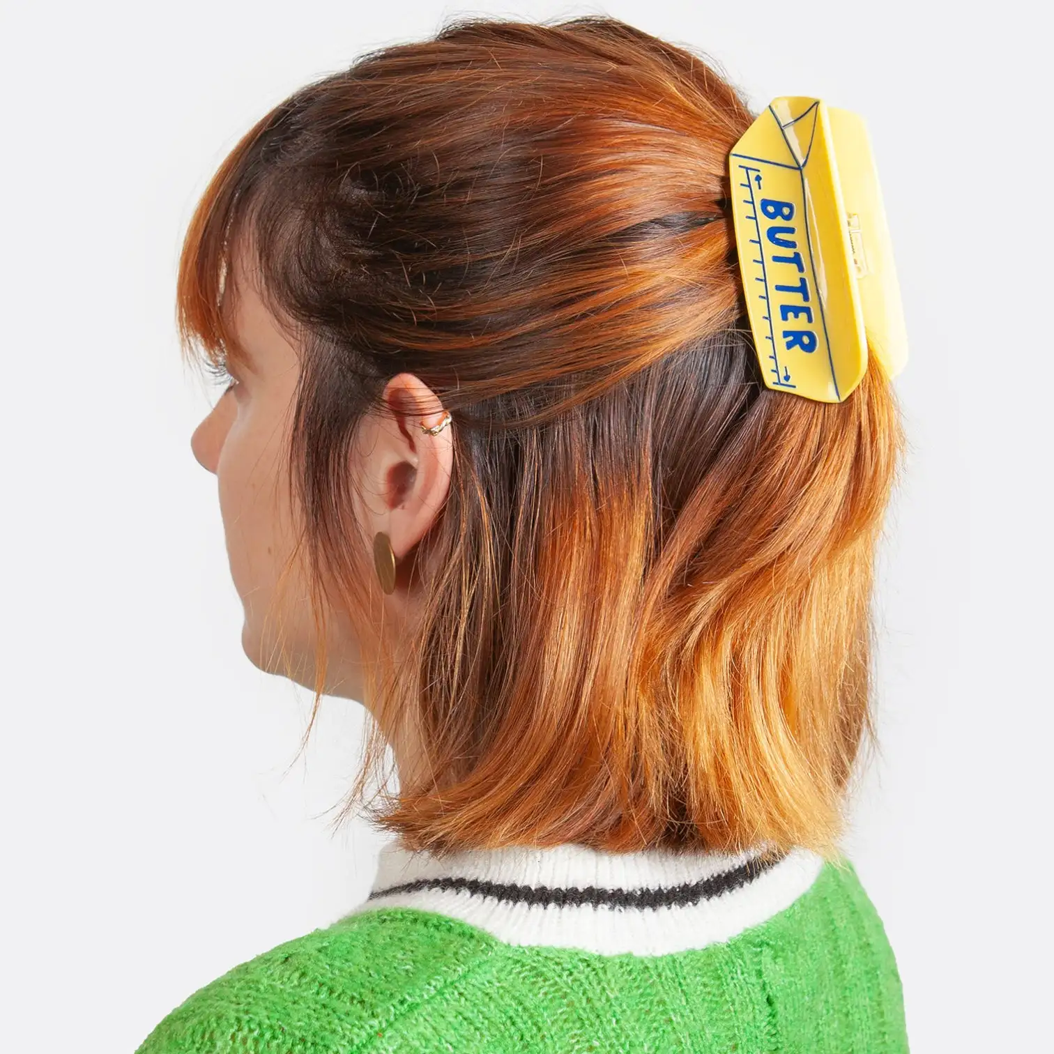 Mantequilla de garra del cabello