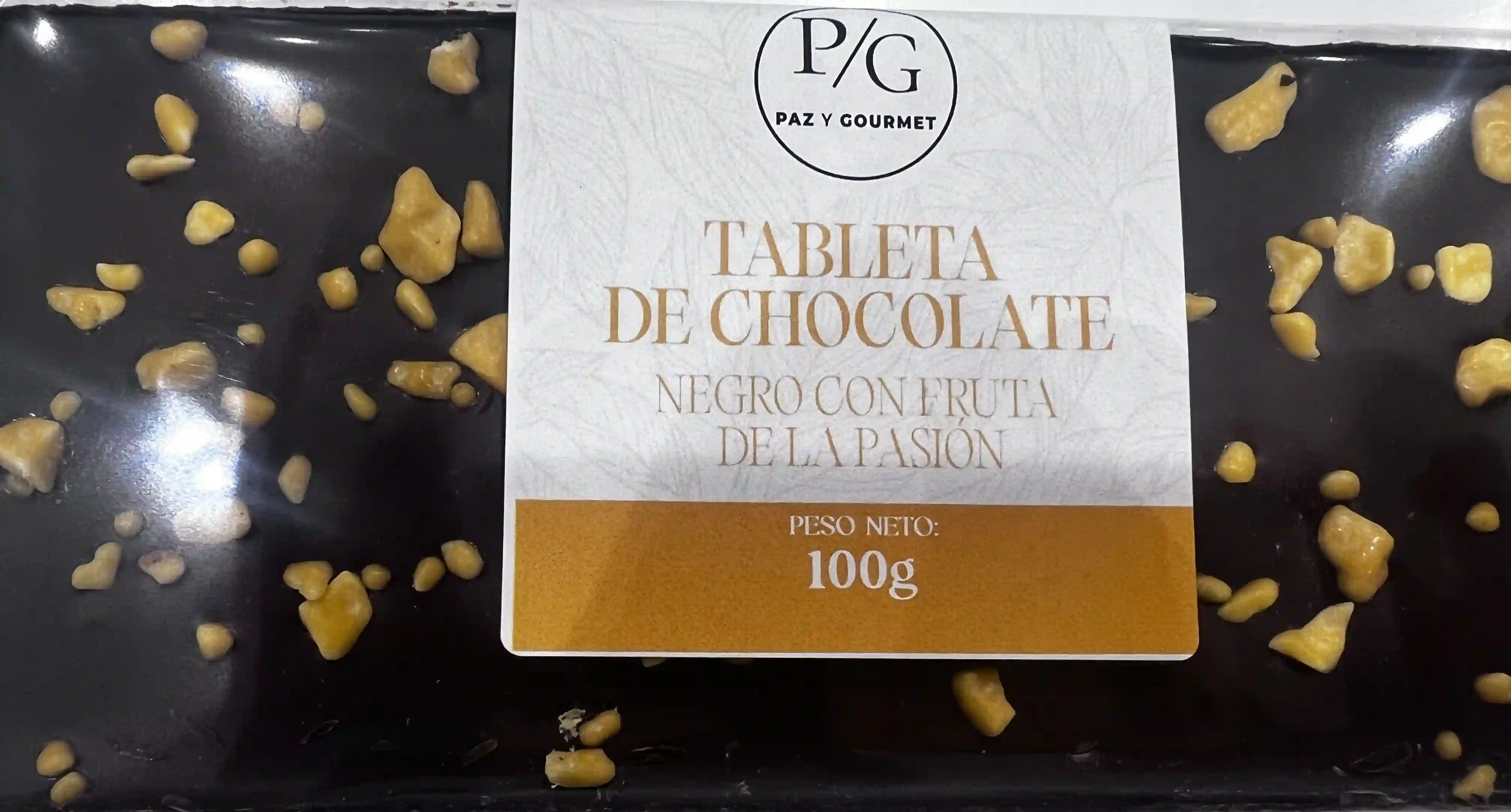 Tableta de chocolate negro con fruta de la pasión (100 gr )