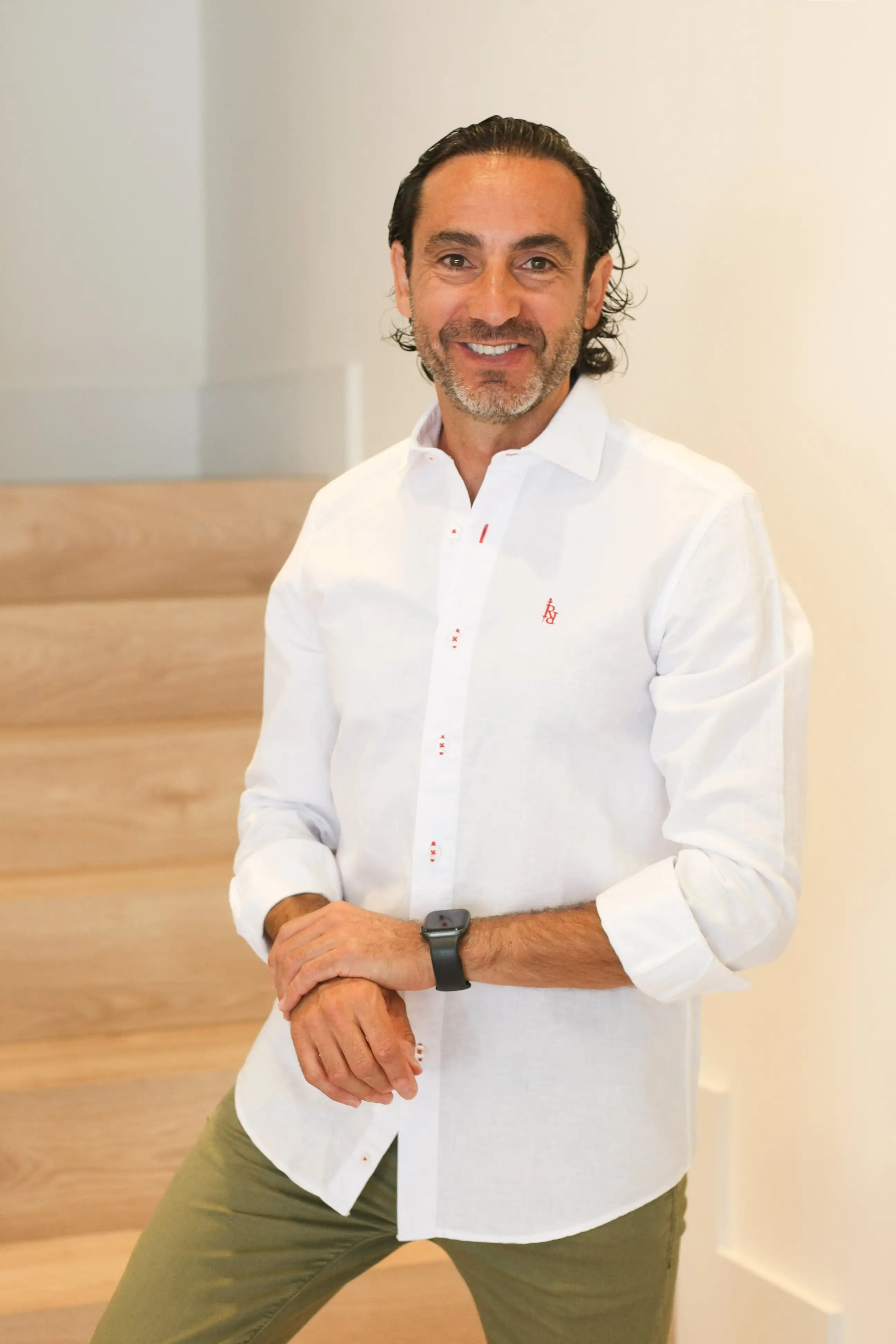 White linen shirt with "cream" embroidery logo.