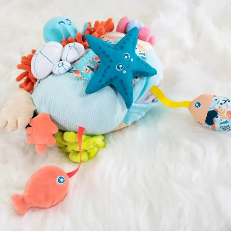 Peluche sensorial, coral - Miniland