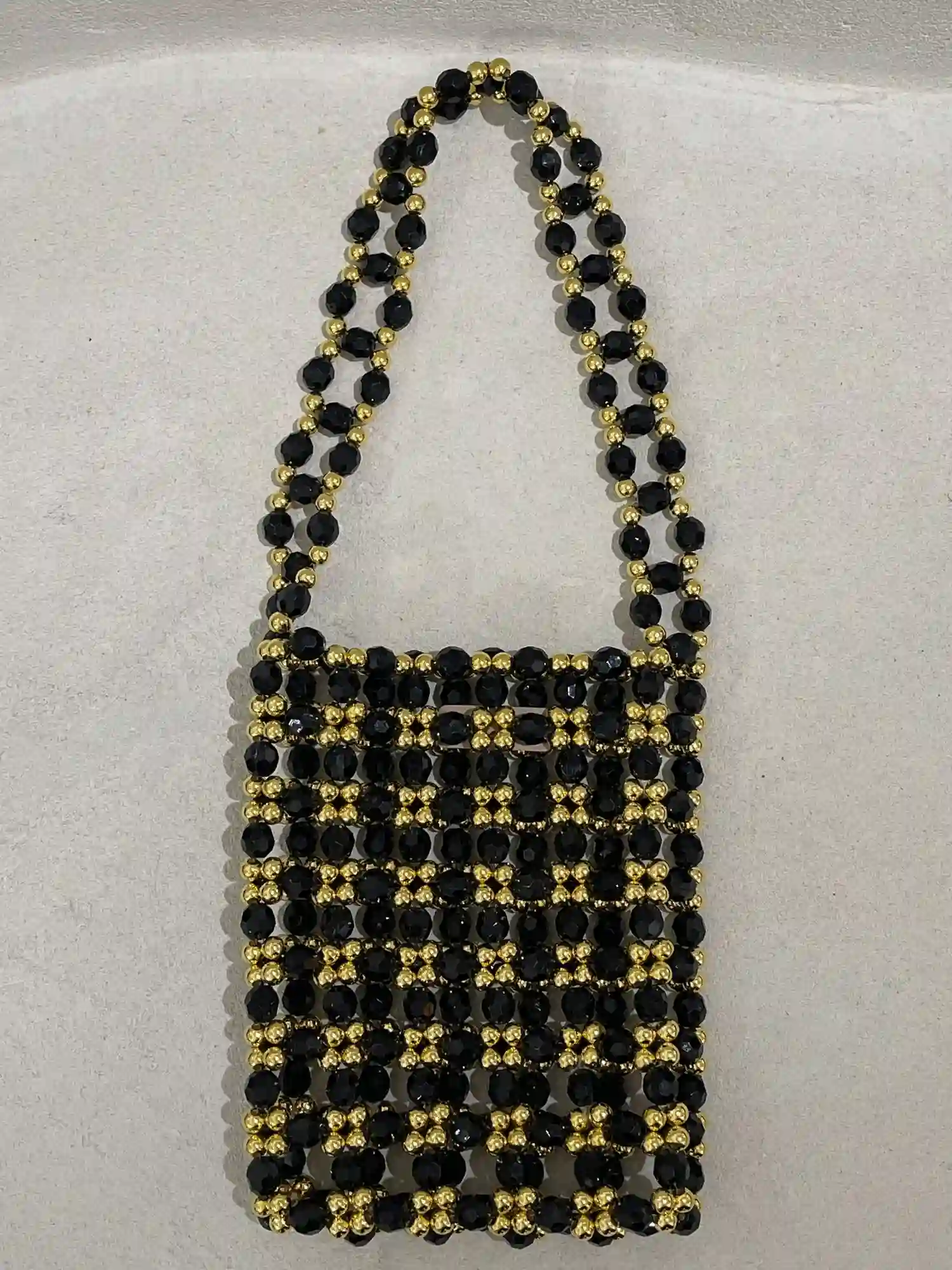 BOLSO BICOLOR DORADO Y NEGRO / SIZRU