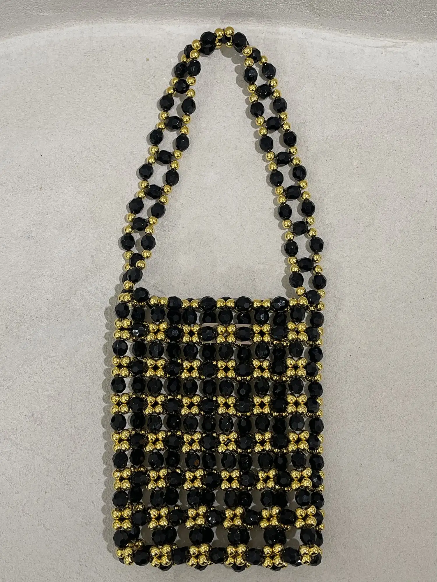BOLSO BICOLOR DORADO Y NEGRO / SIZRU