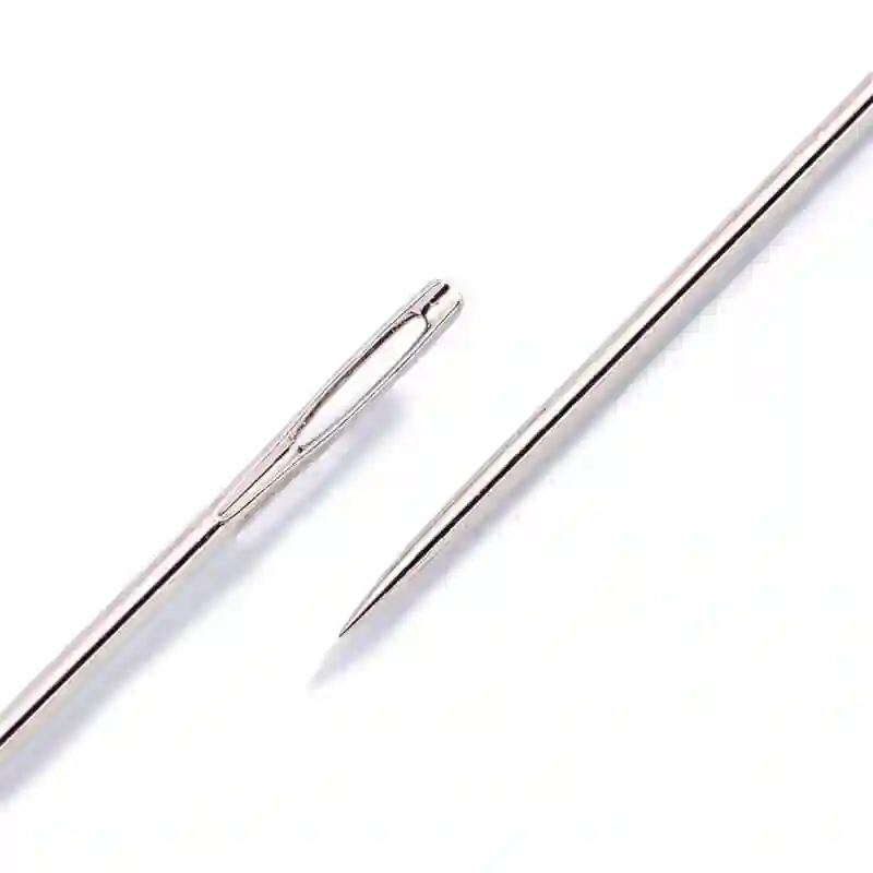 Aguja para coser muñecas