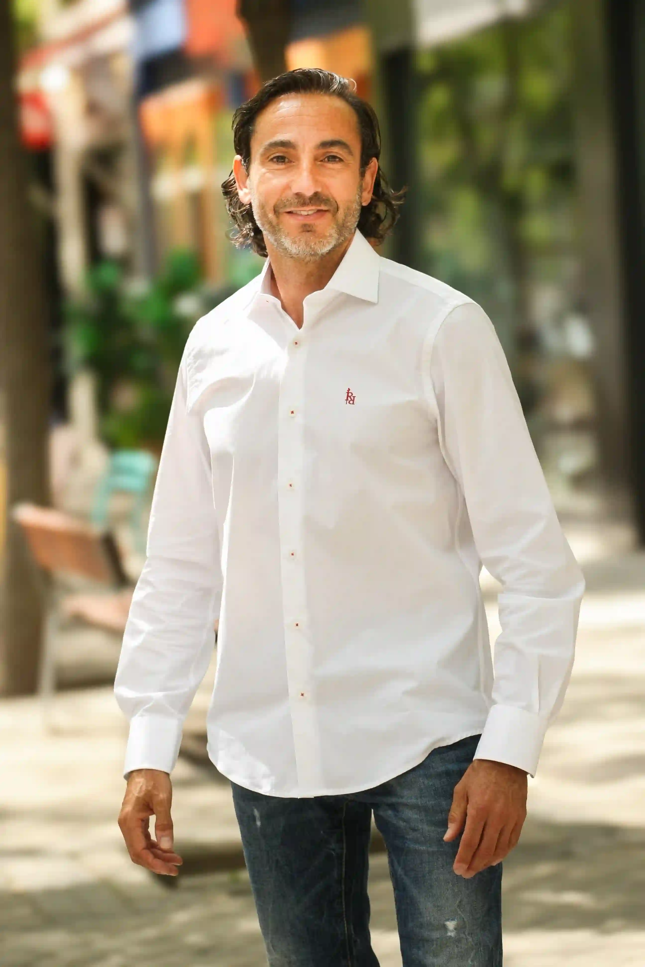White shirt with embroidery in red "Pamplona".