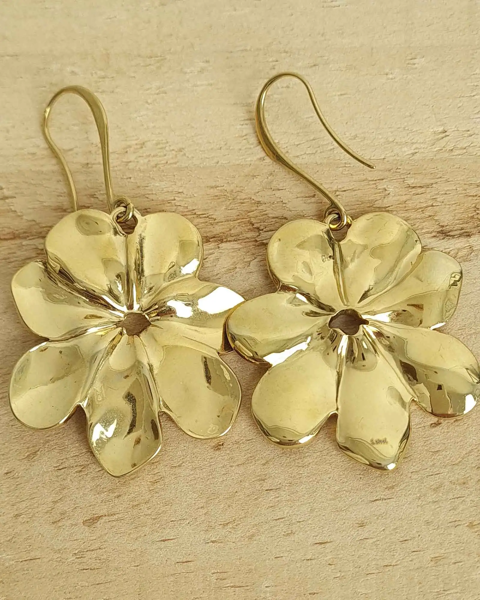 Golden earrings flower