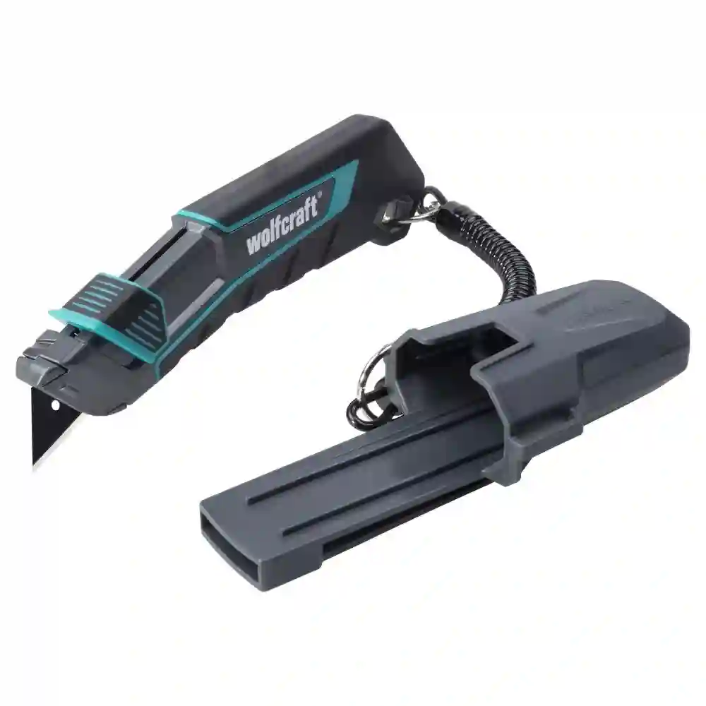 Cúter de cuchilla trapezoidal PRO SAFETY con estuche Wolfcraft