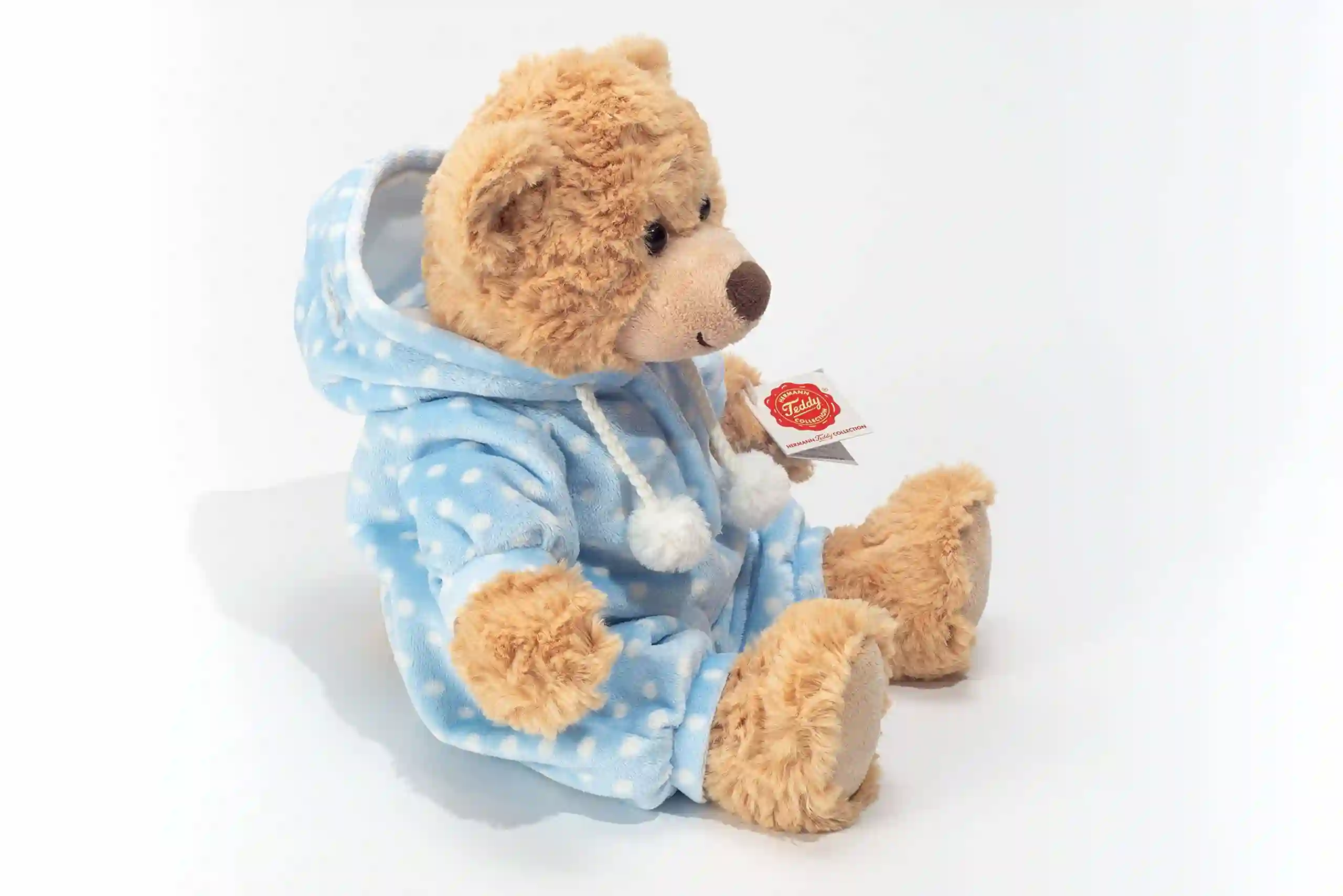 Peluche marrón 30 cm con pijama azul