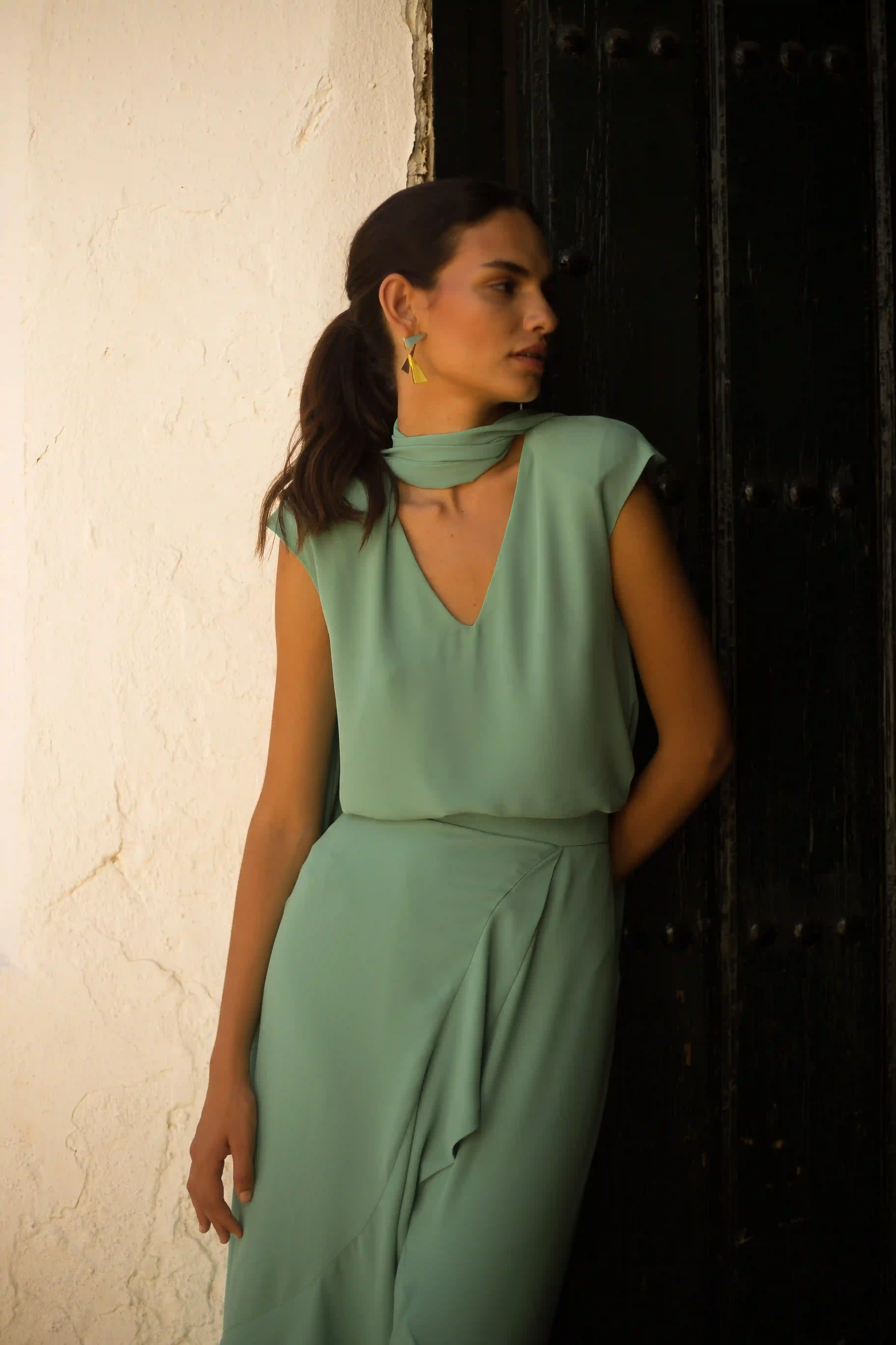 Conjunto top y falda cruzada con vuelo verde agua
