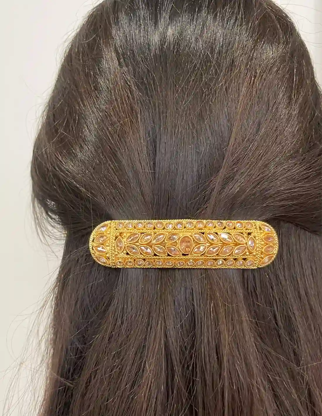 Dorado pin with pink hair crystals