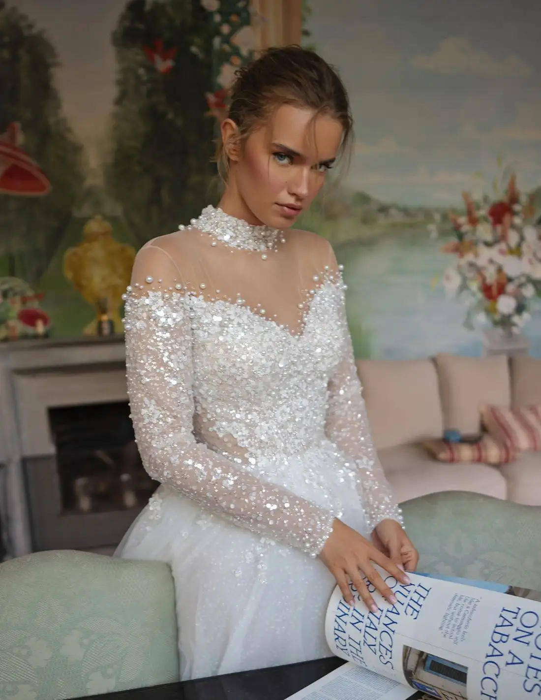 Vestido de novia marfil con escote y espalda ilusión, silueta princesa
