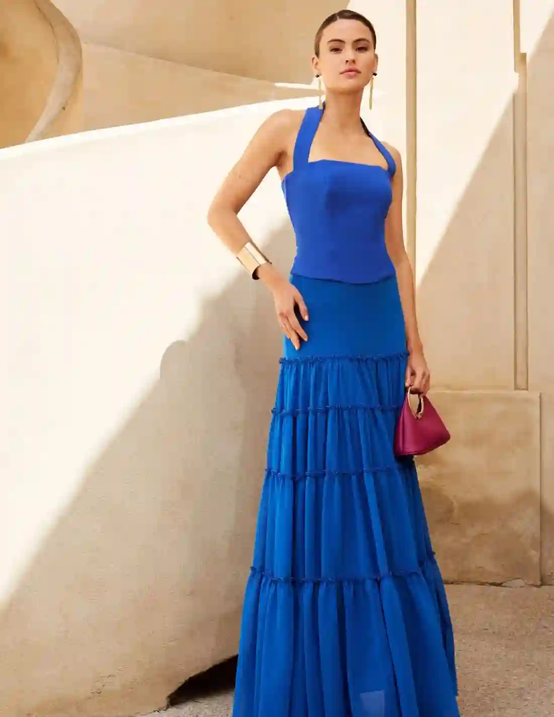 Falda larga de gasa azul con volantes